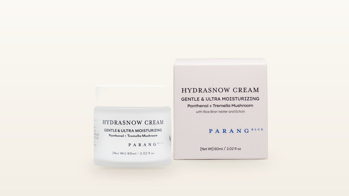 Parang Blue Hydrasnow Cream jar with its carton